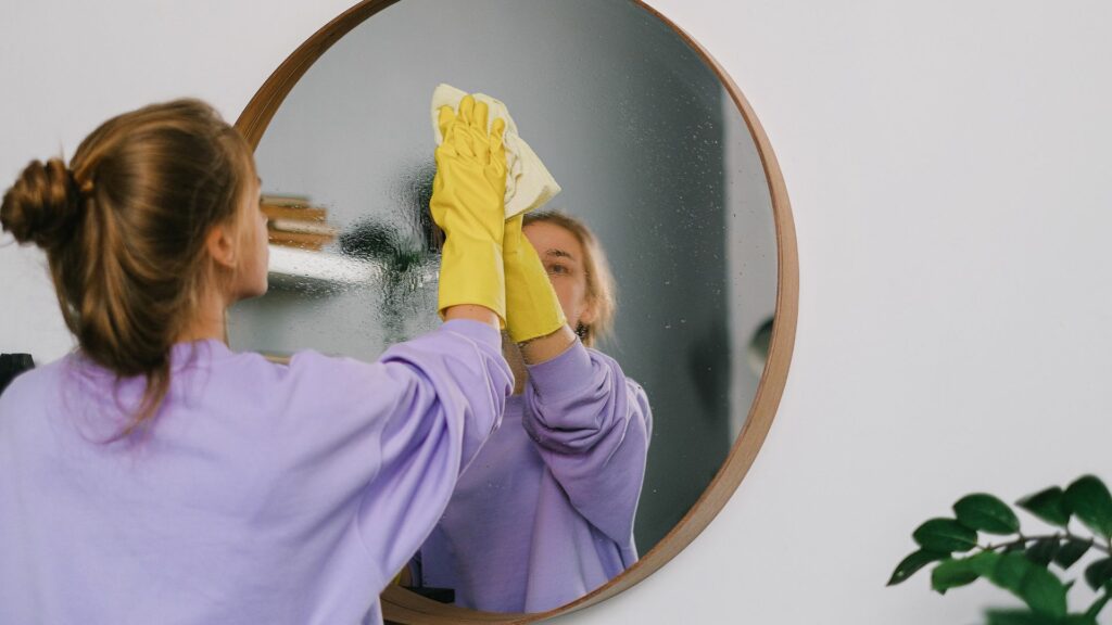 Mirror being cleaned